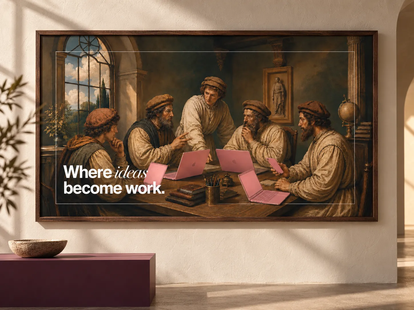 The DragonFruit renaissance painting with pink laptops, framed as a poster on a plaster wall